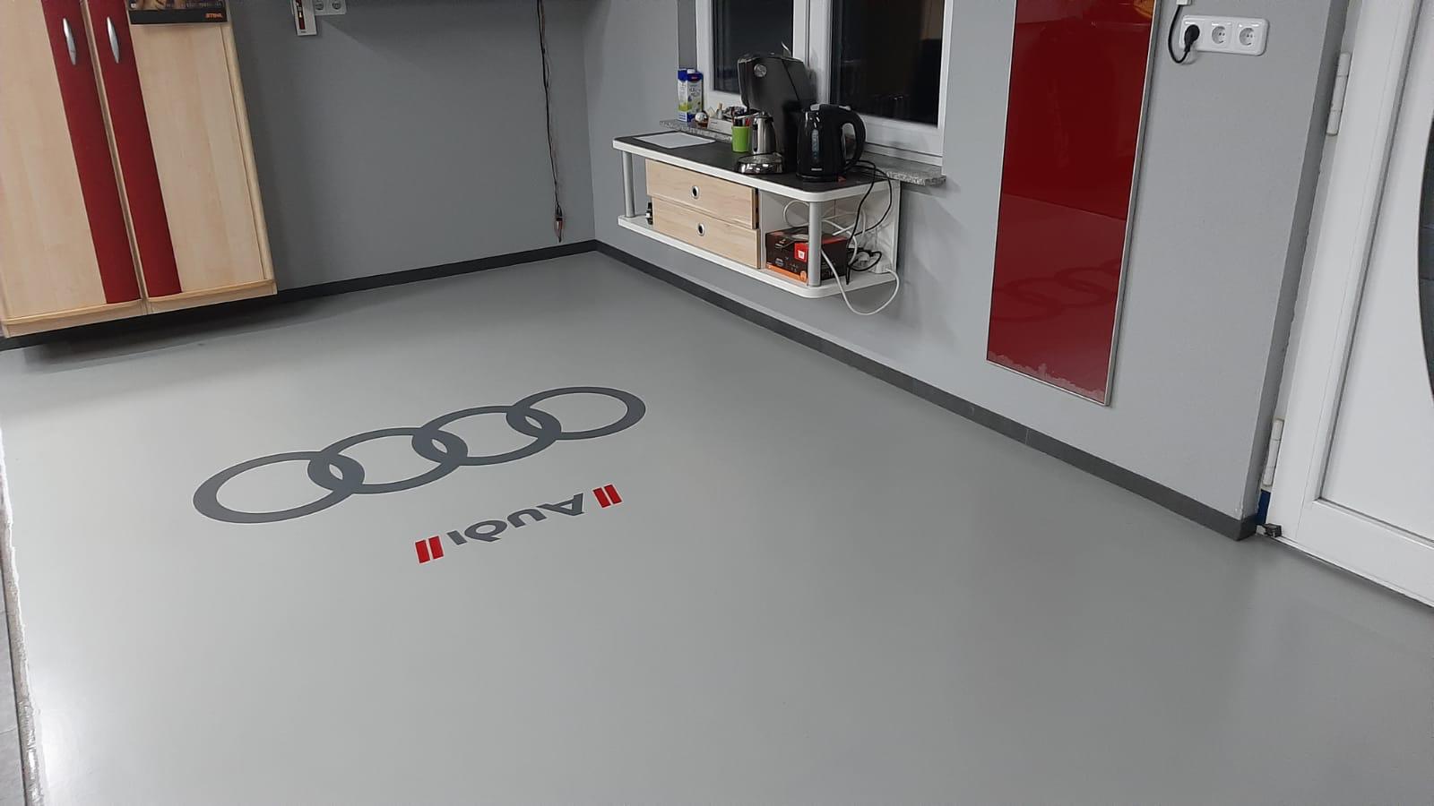 Garagenbeschichtung mit Audi-Logo